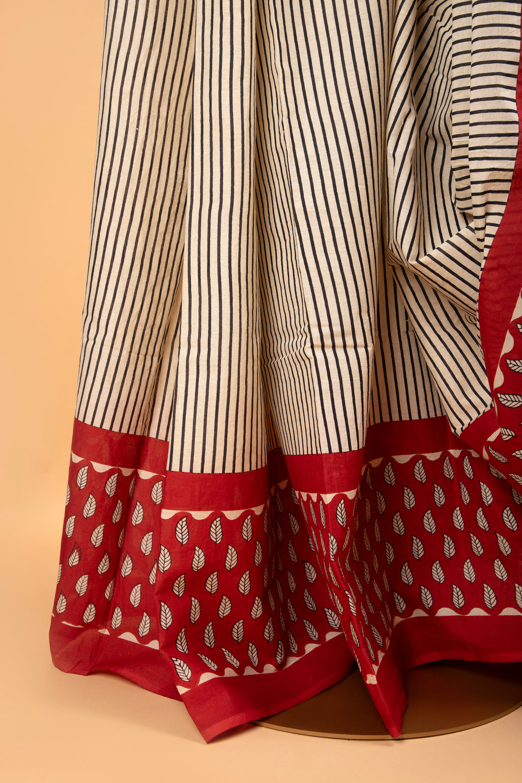 Beige and red hand block print saree