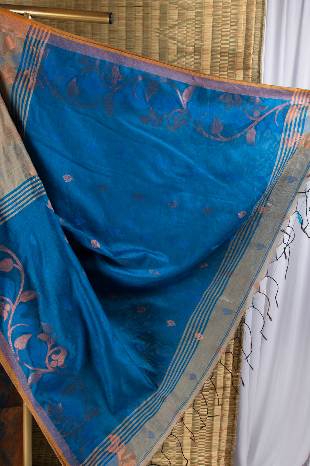 Earthy beige and blue silk cotton saree