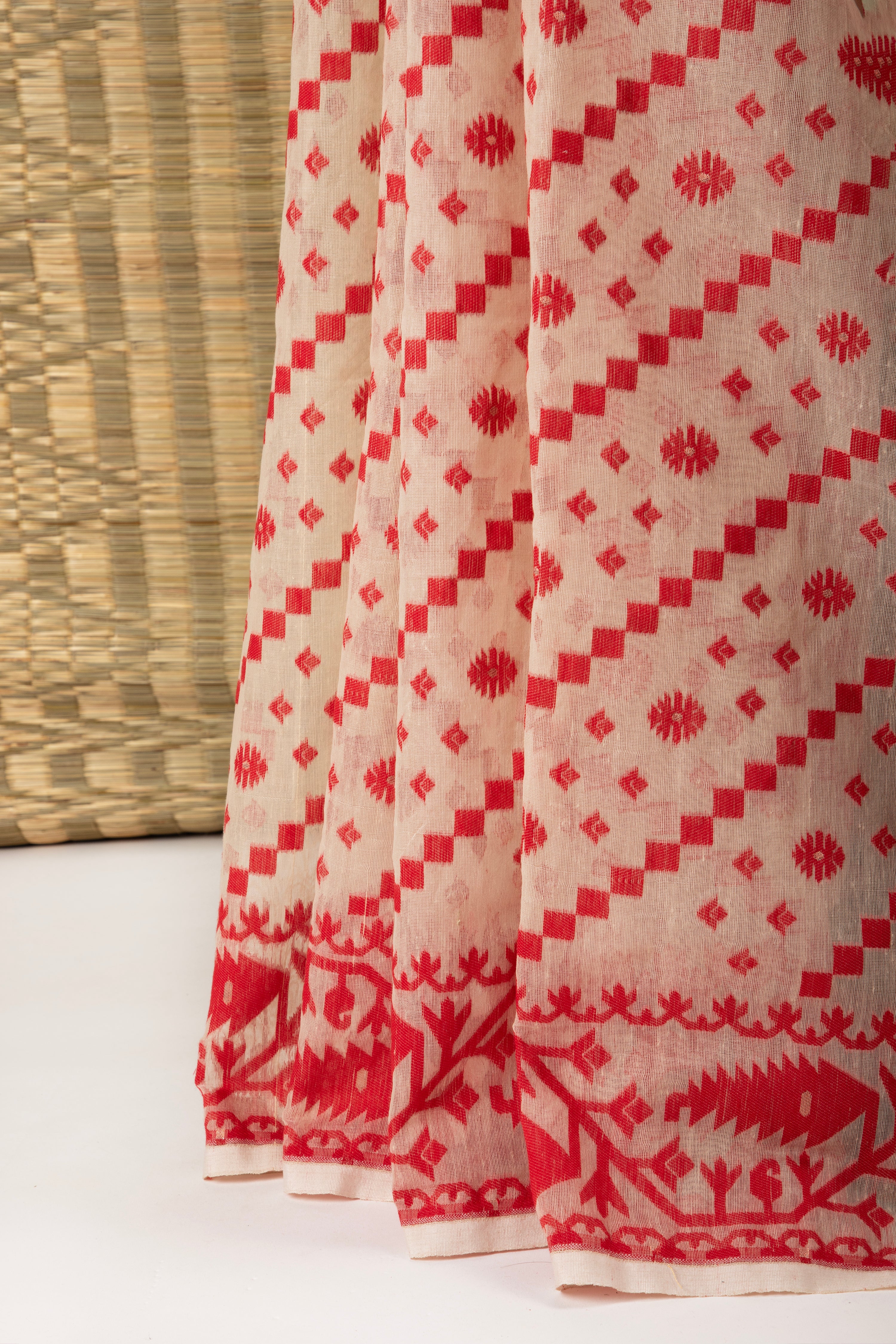 Red and white jamdani saree