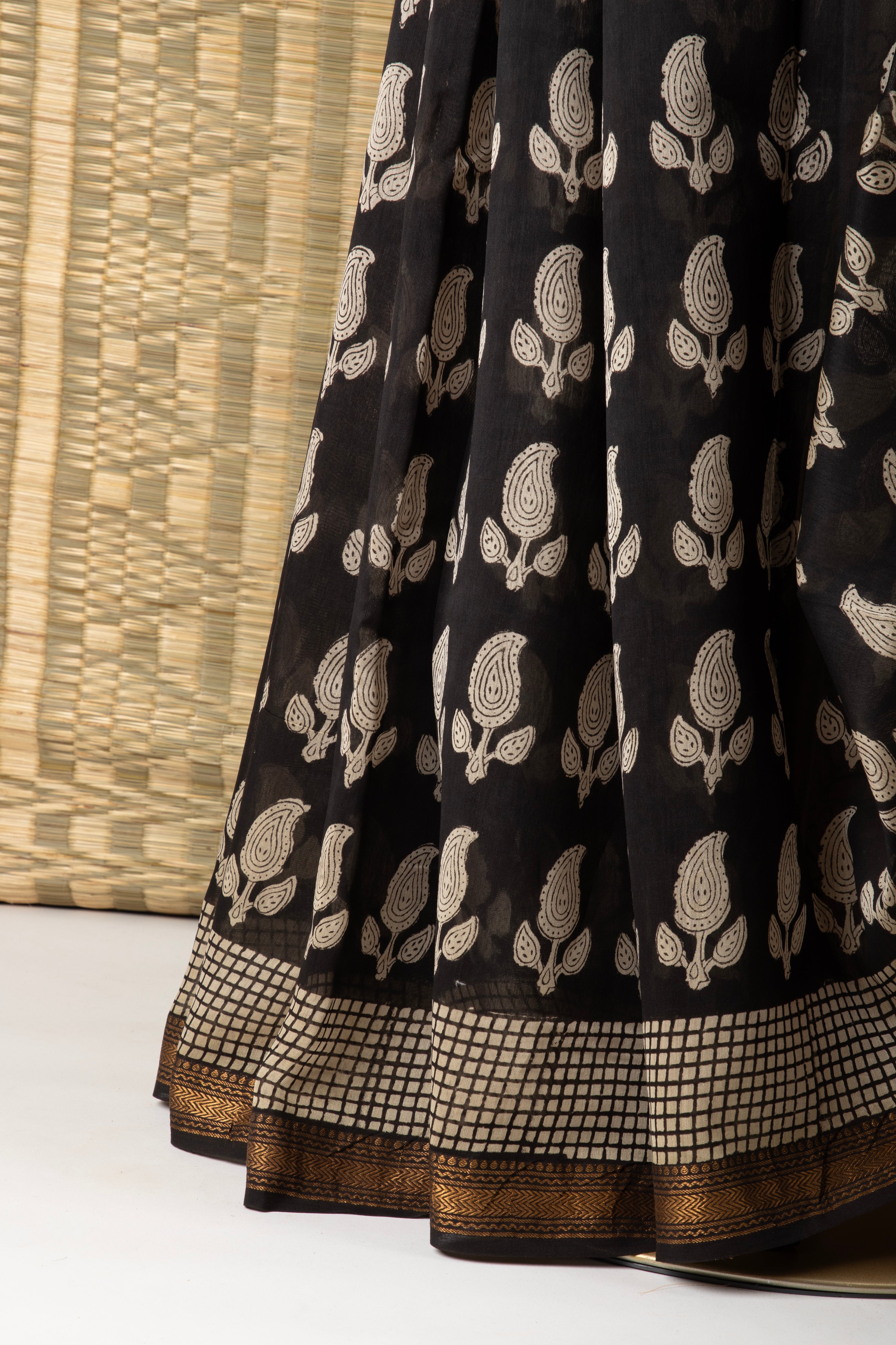 Black silk cotton block print saree with paisley motif