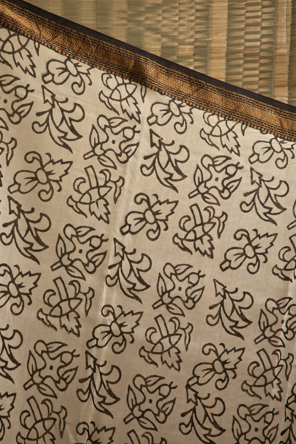 Black silk cotton block print saree with paisley motif