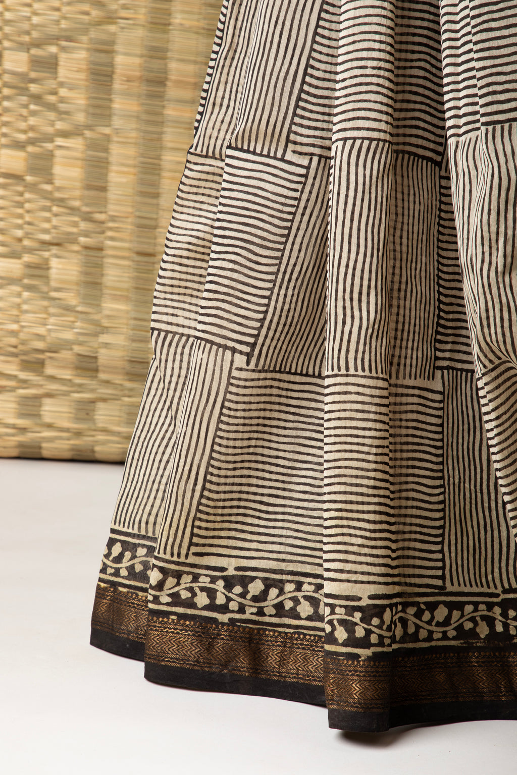 Striped black and beige silk cotton block print saree