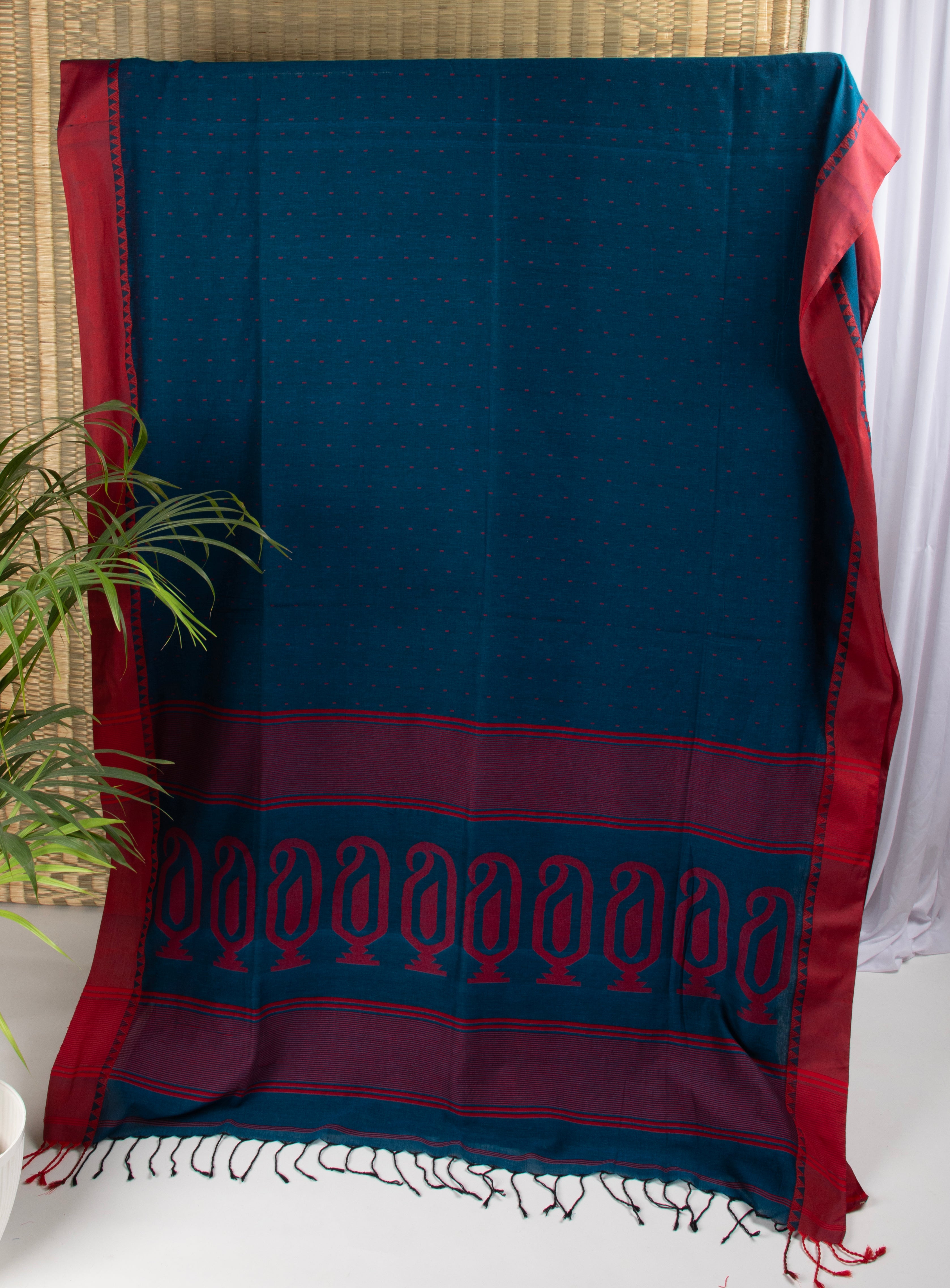 Royal blue and red saree with multiple butis