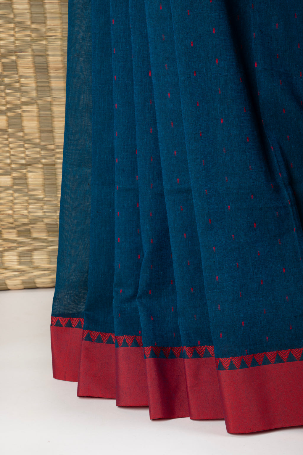 Royal blue and red saree with multiple butis