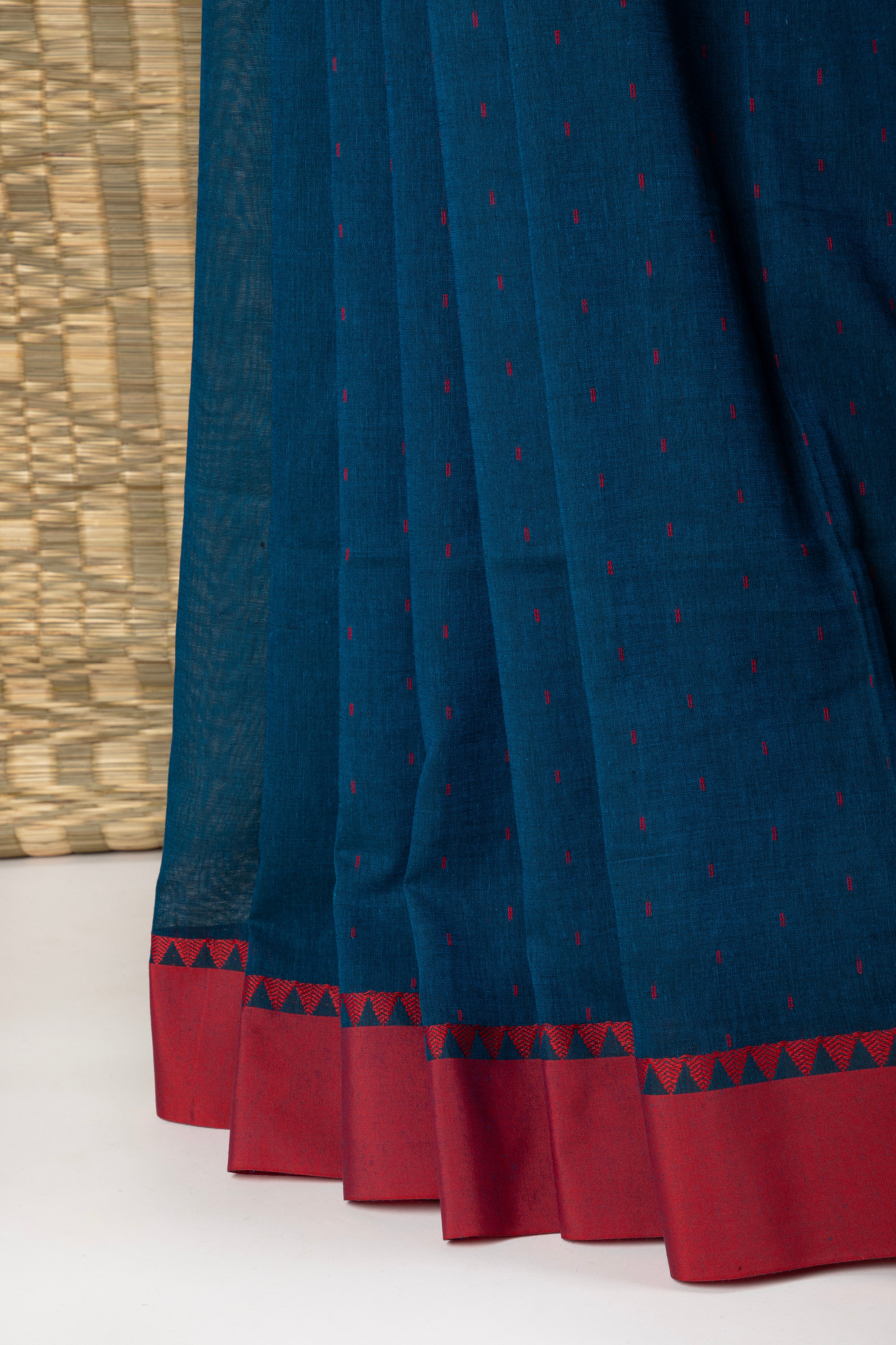 Royal blue and red saree with multiple butis
