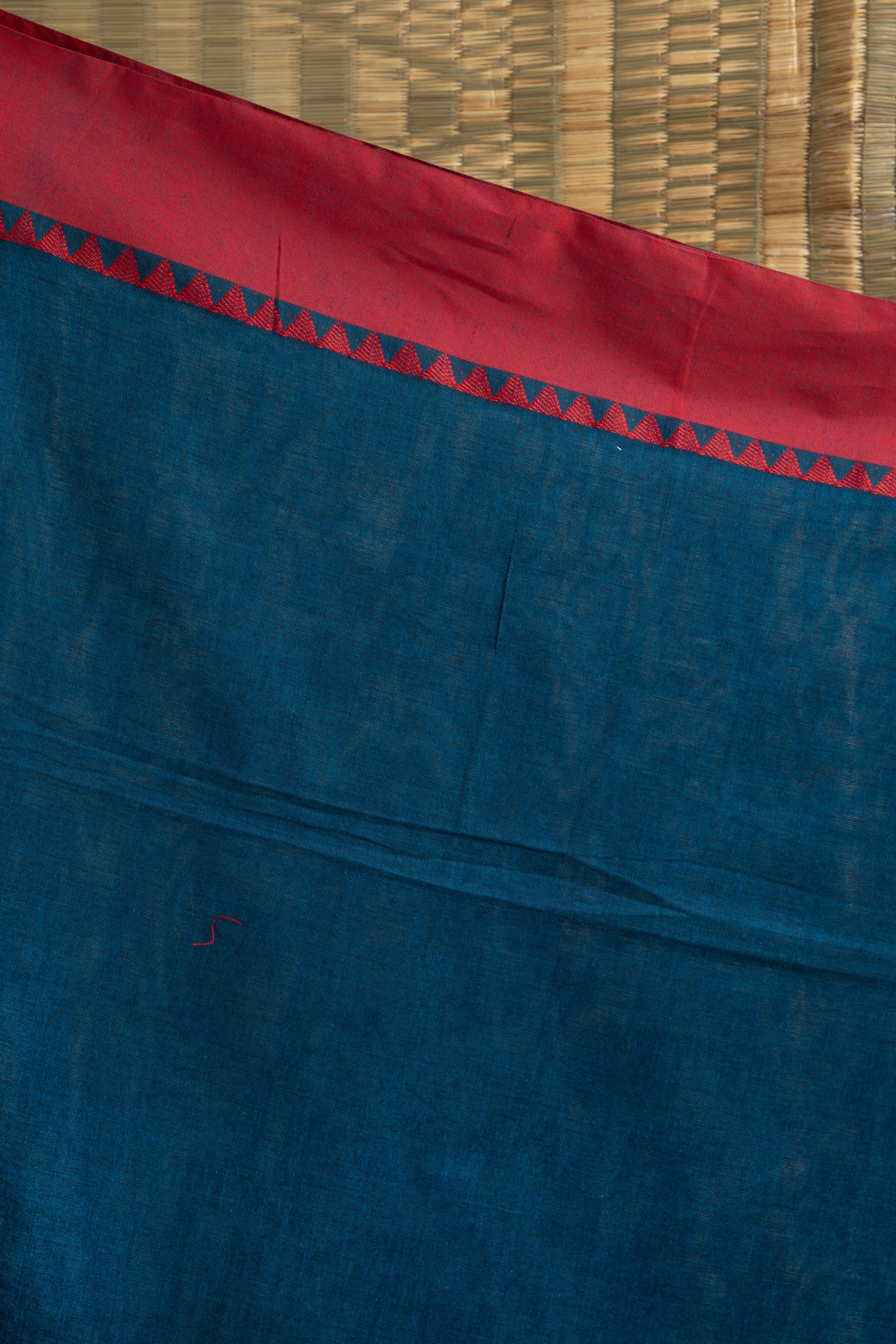 Royal blue and red saree with multiple butis