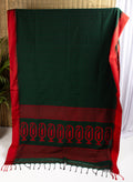 Bottle green saree with multiple butis