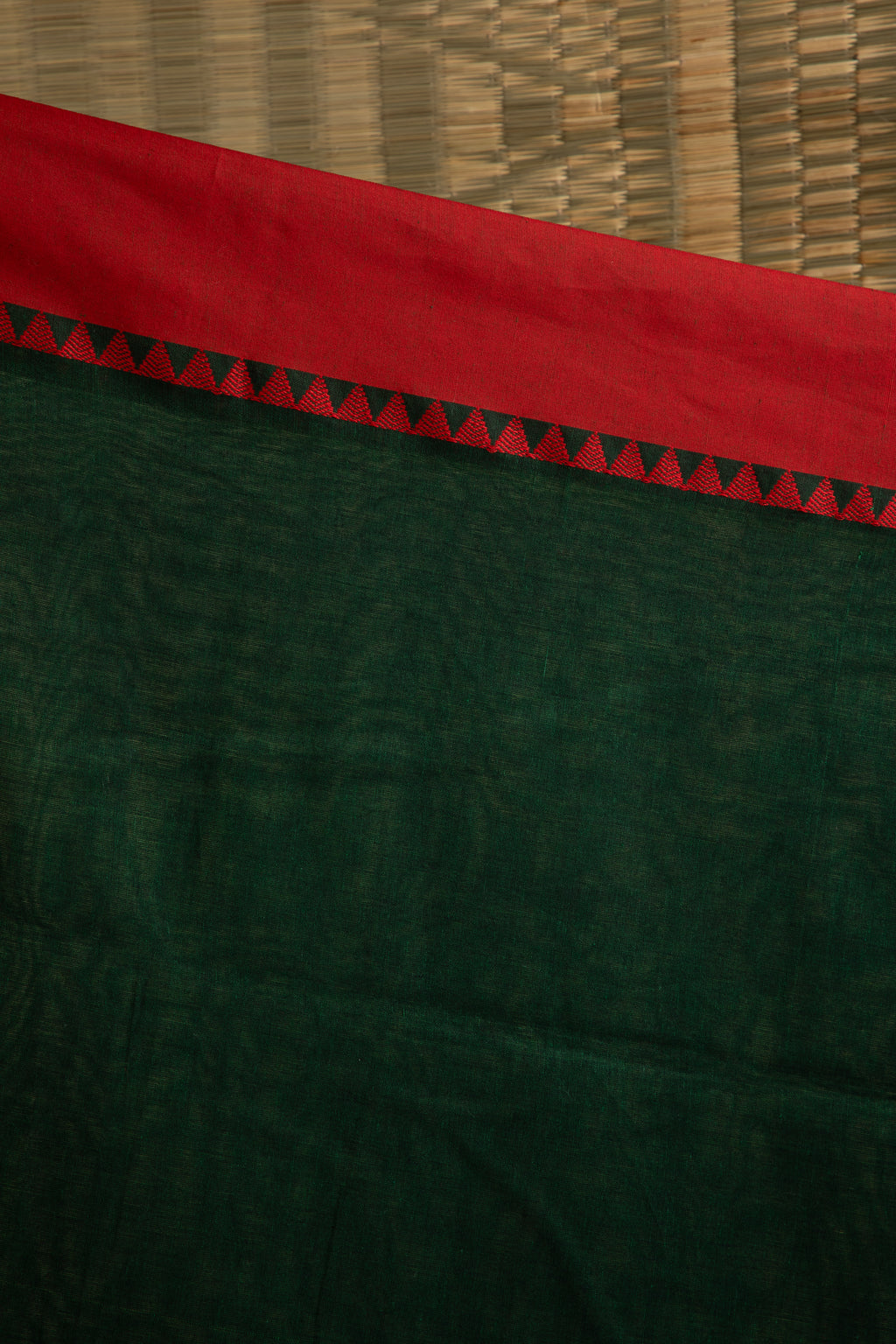 Bottle green saree with multiple butis