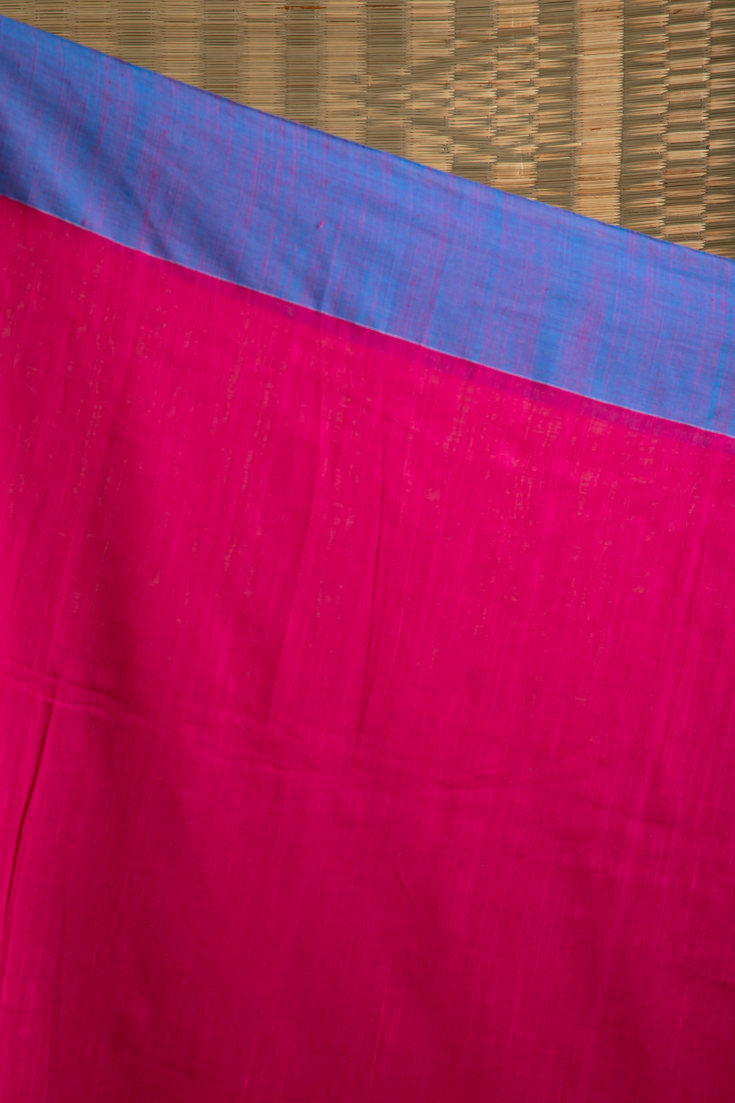 Magenta pink handloom saree with blue border