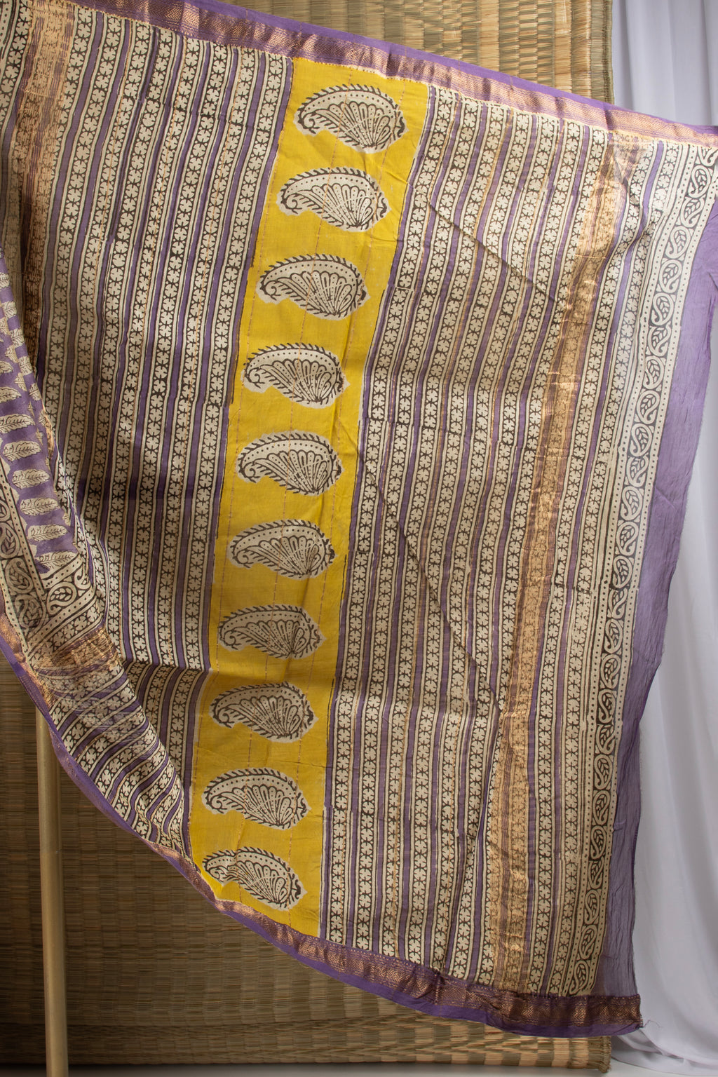 Purple and yellow silk cotton block print saree
