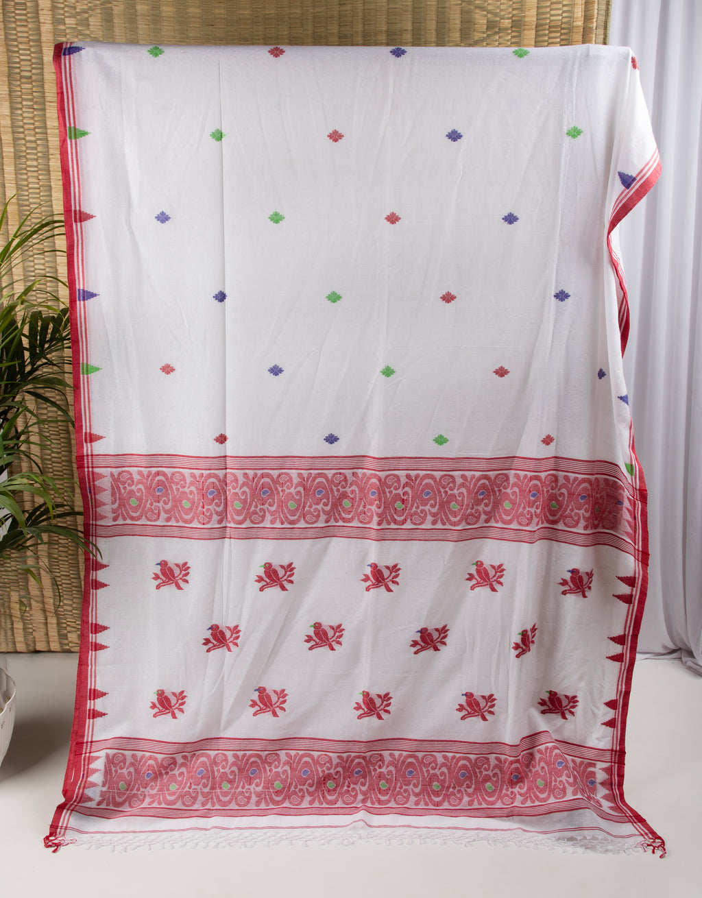 Red and white saree with bird motif