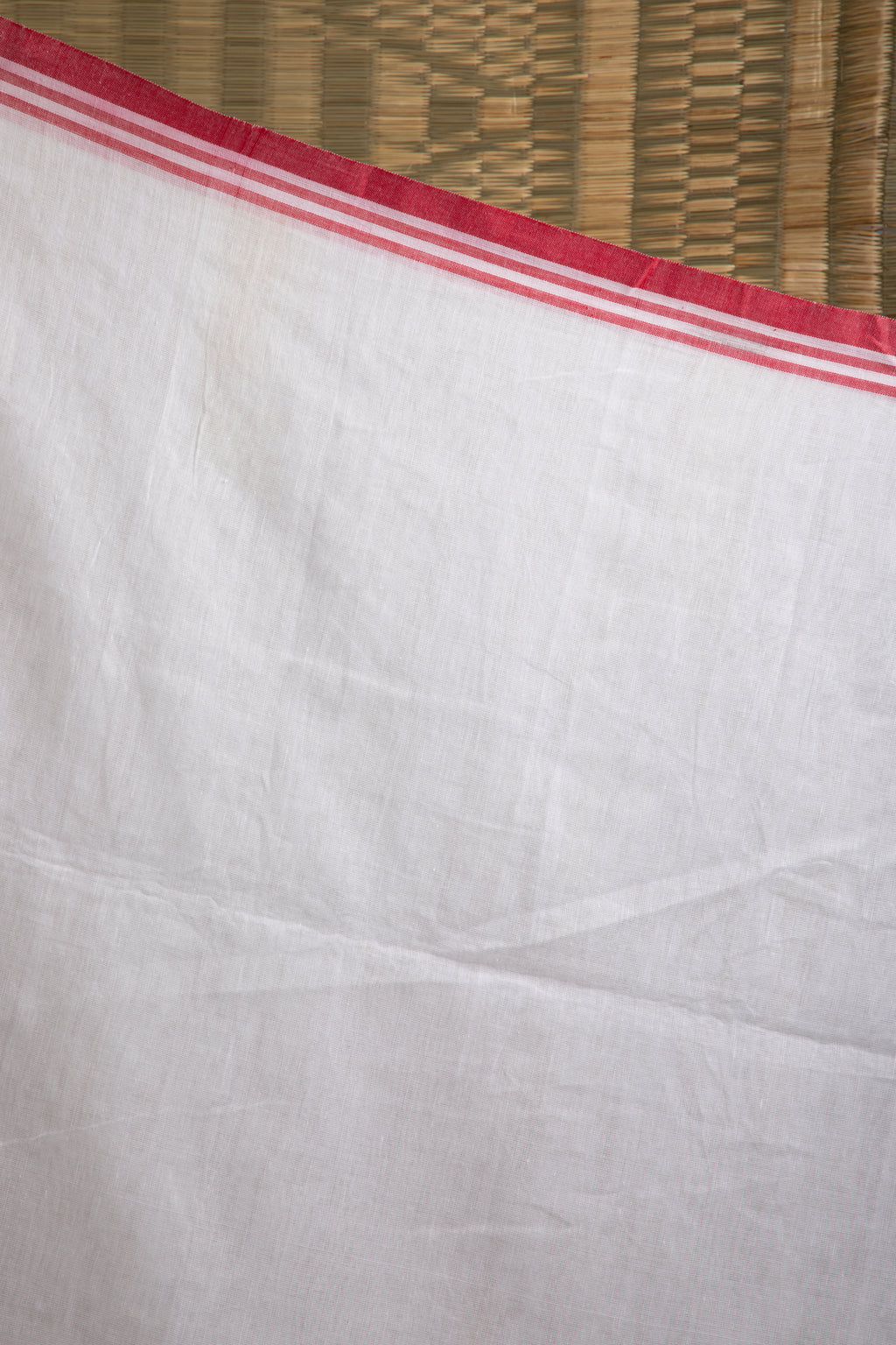 Red and white saree with bird motif