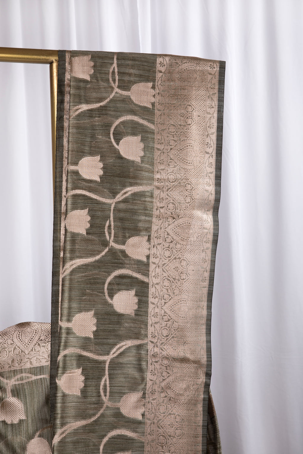 Olive green semi tussar benarasi saree with tulip design