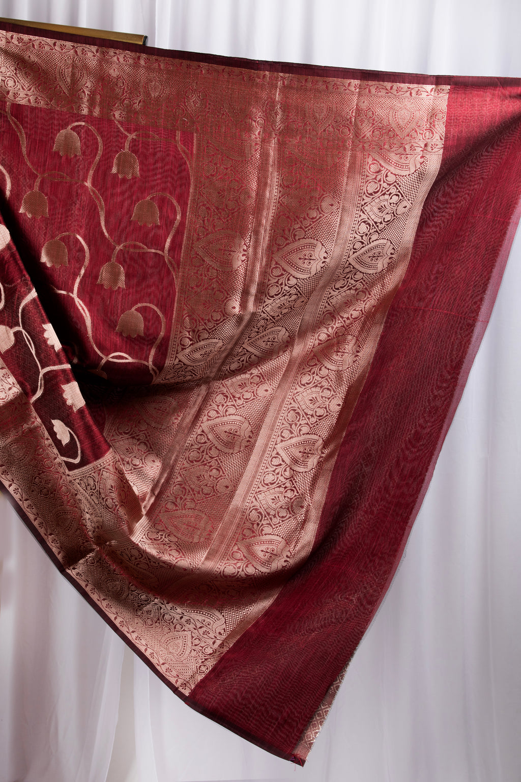 Maroon semi tussar benarasi saree with tulip design