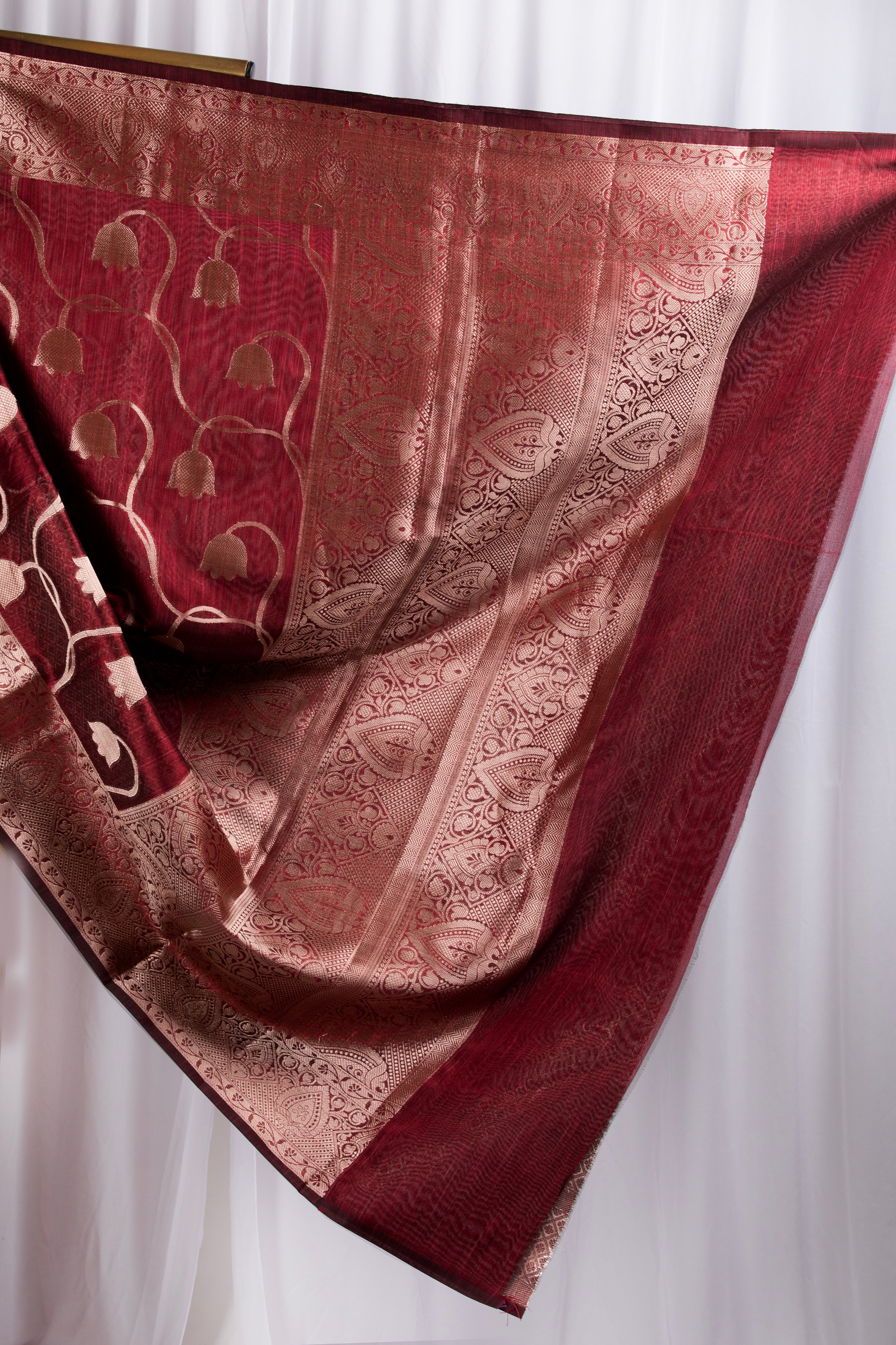 Maroon semi tussar benarasi saree with tulip design