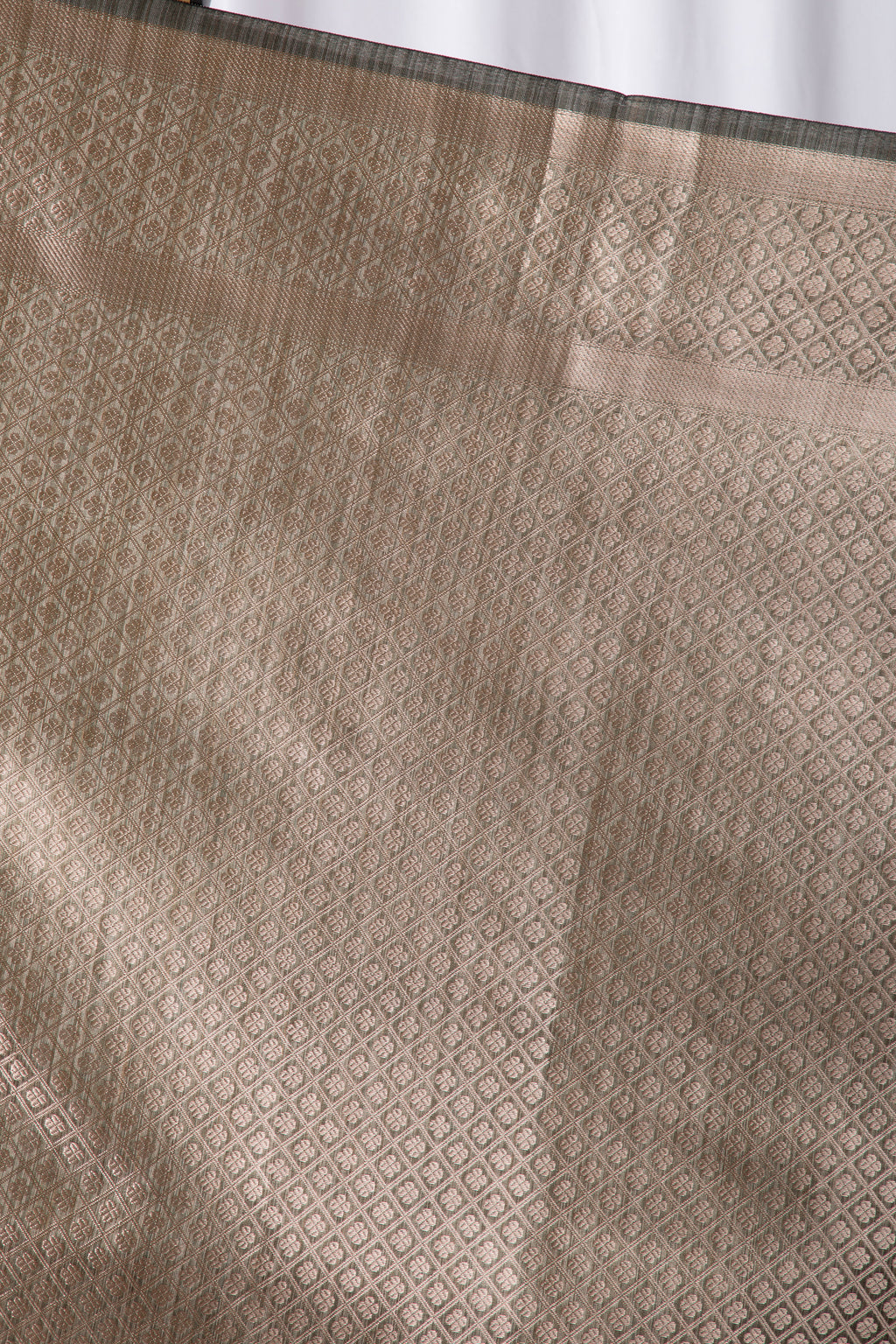 Olive green semi tussar benarasi saree with tulip design