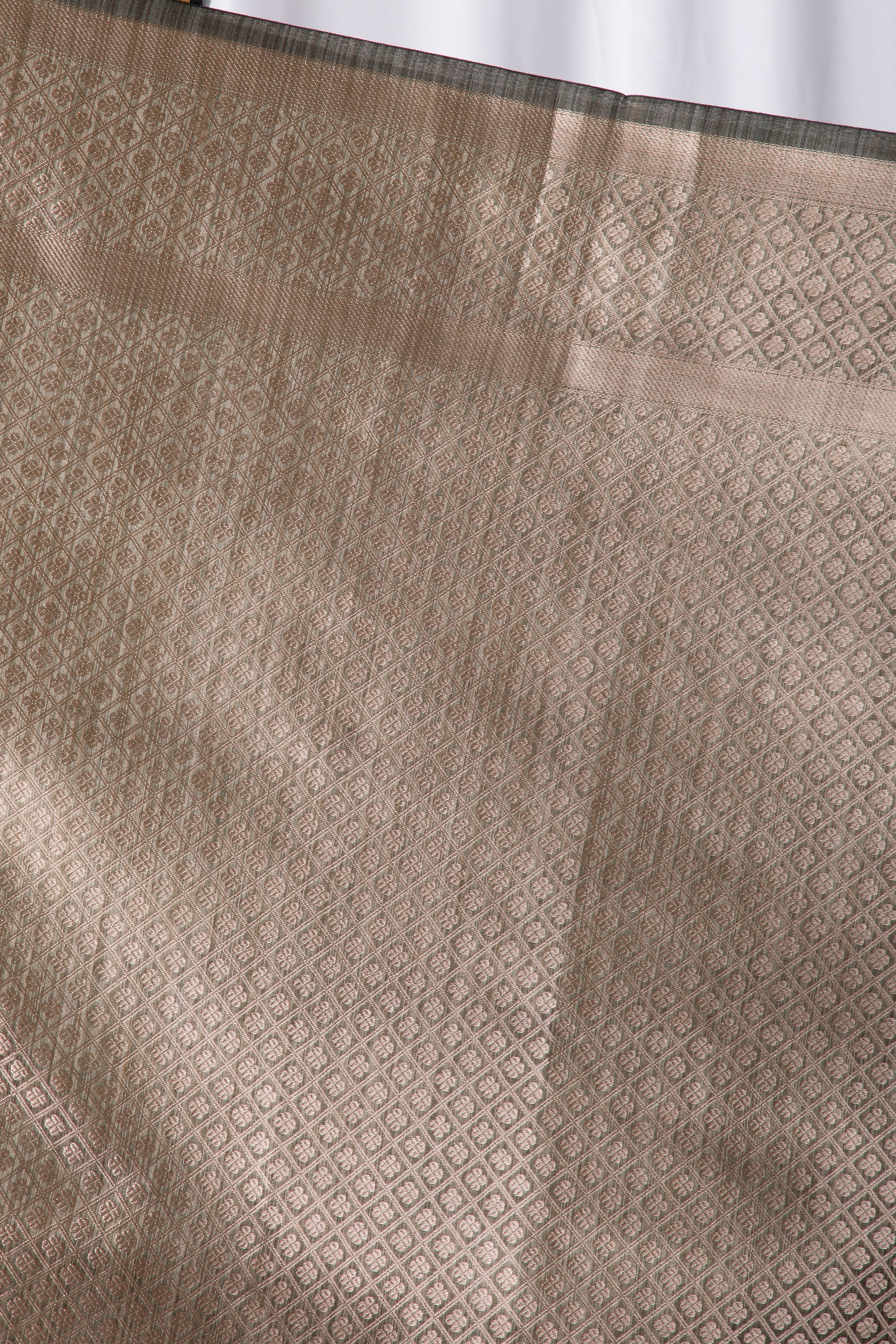 Olive green semi tussar benarasi saree with tulip design