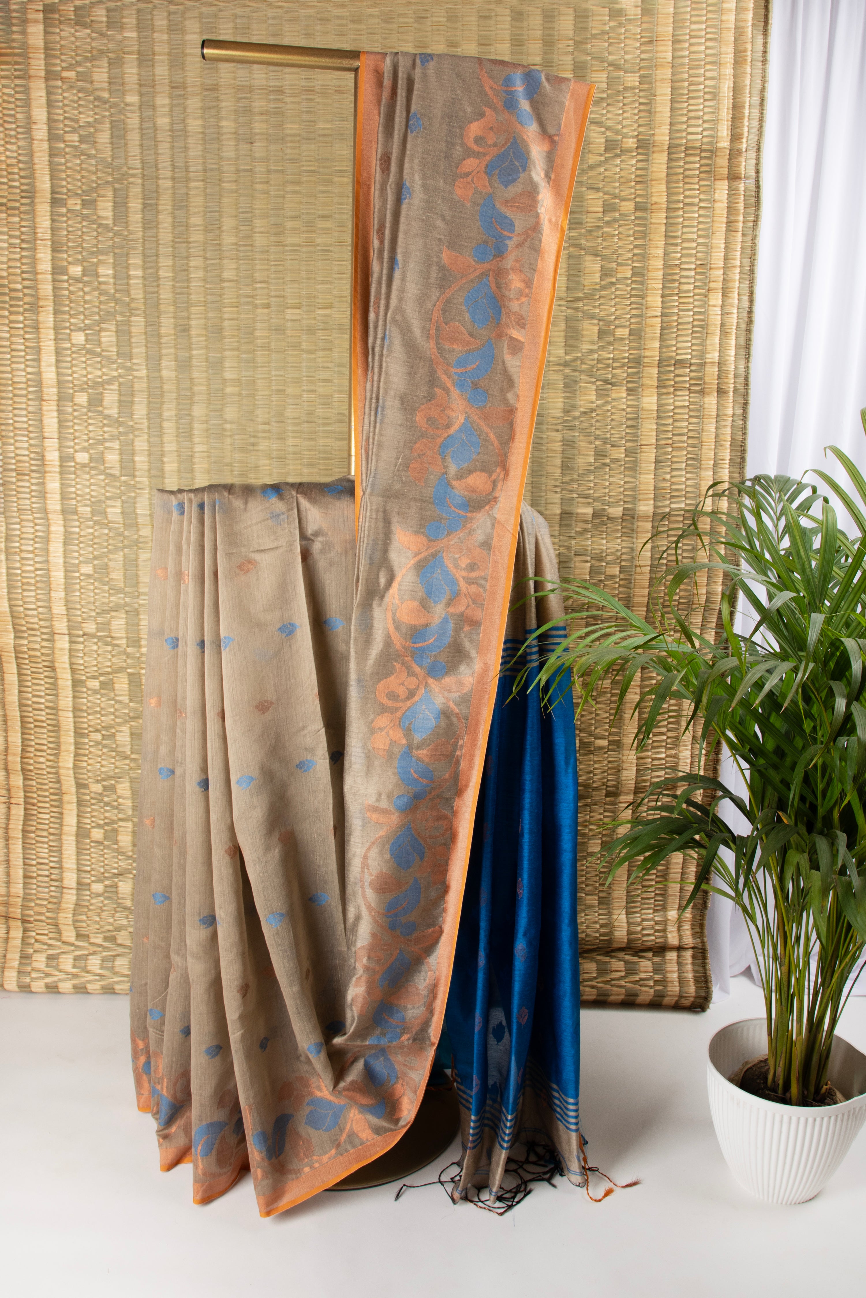 Earthy beige and blue silk cotton saree