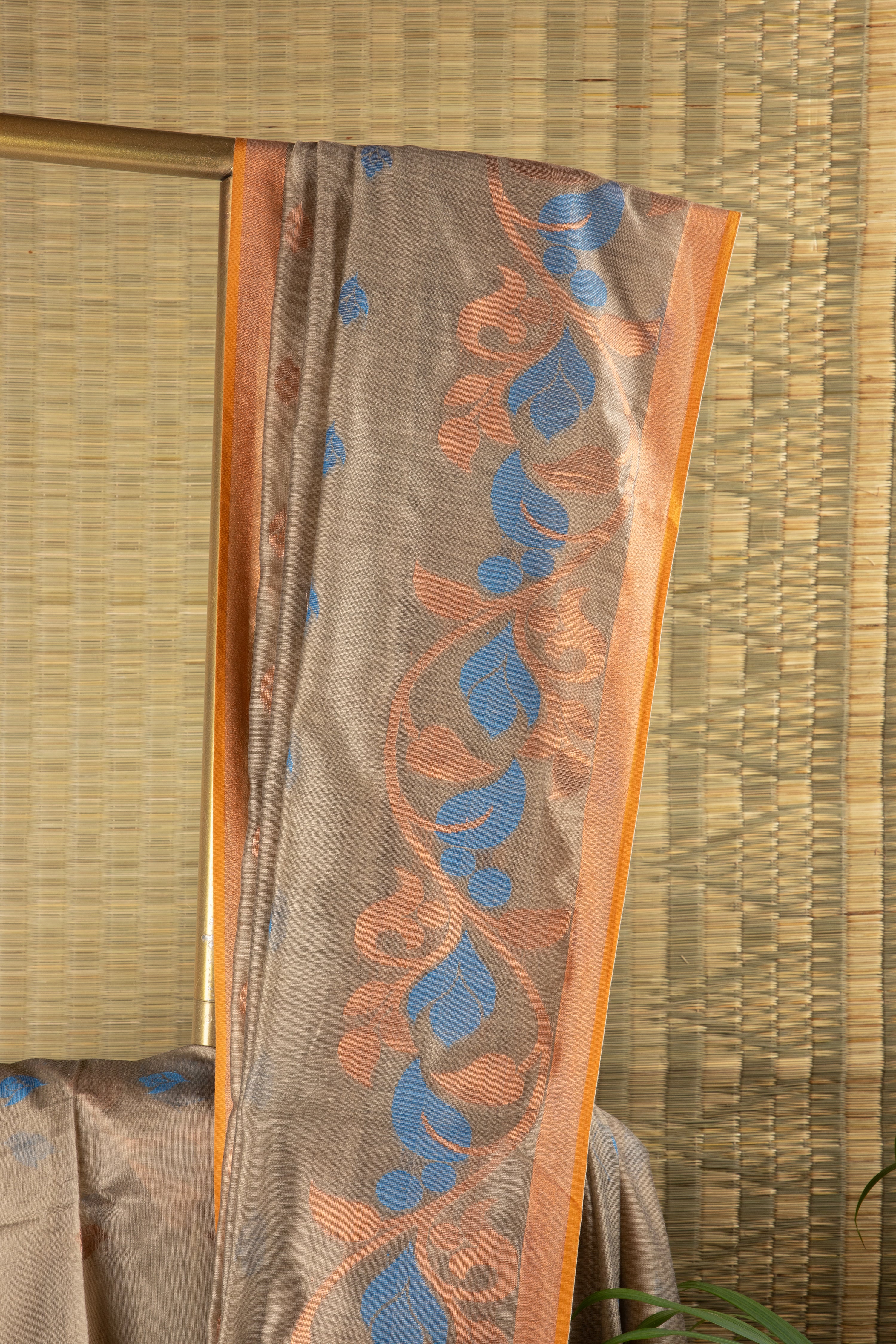 Earthy beige and blue silk cotton saree