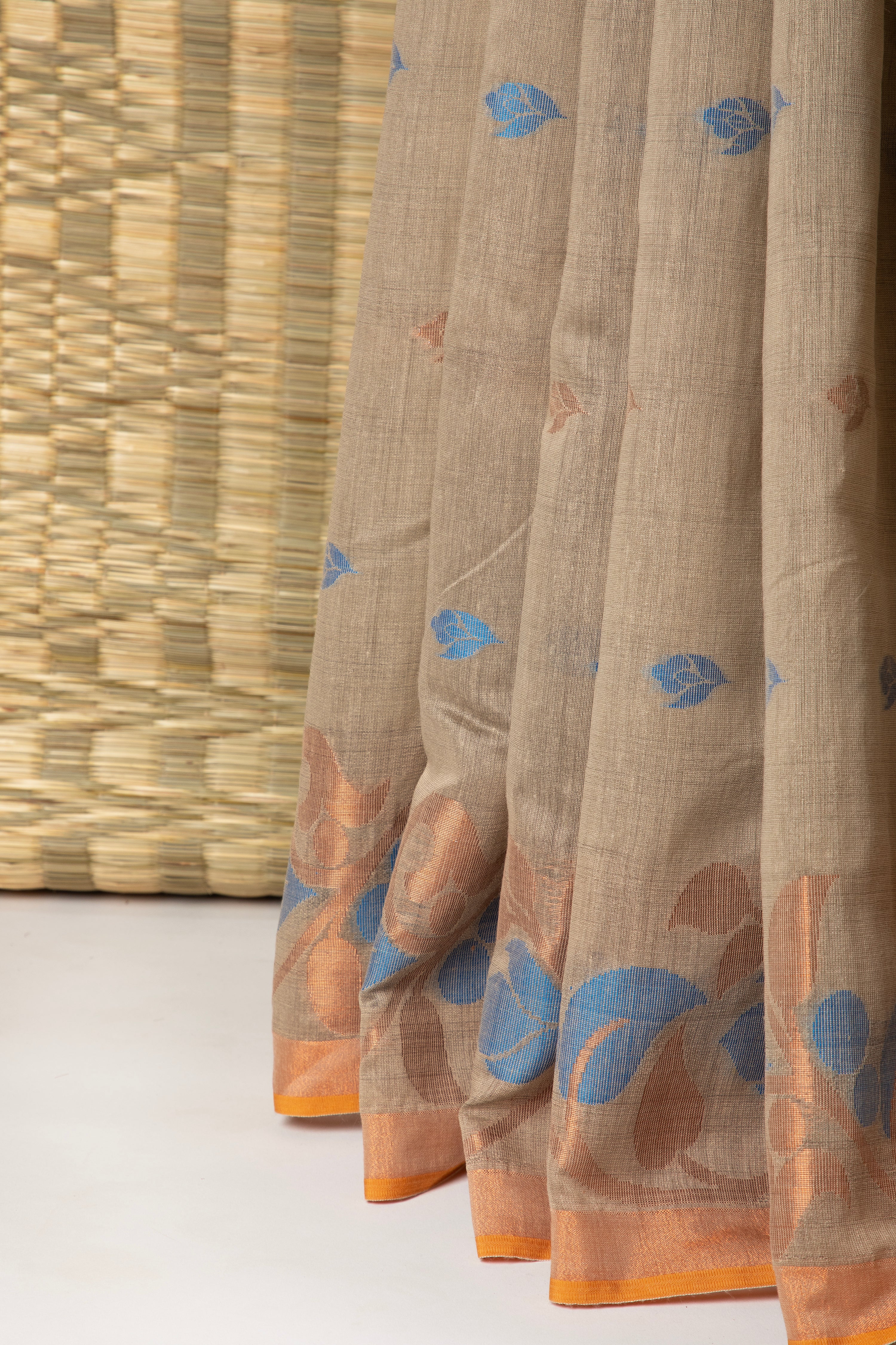 Earthy beige and blue silk cotton saree